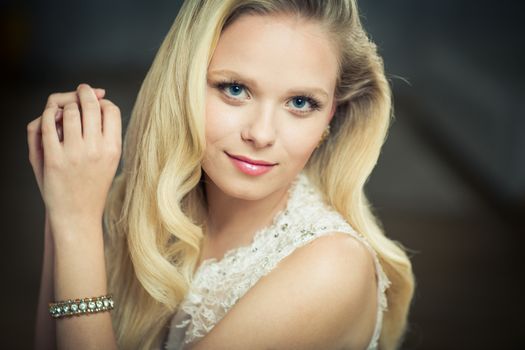 Gorgeous bride on her wedding day (color toned image; shallow DOF)