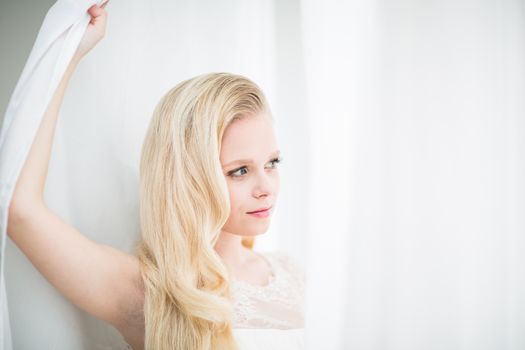 Gorgeous bride on her wedding day (color toned image; shallow DOF)