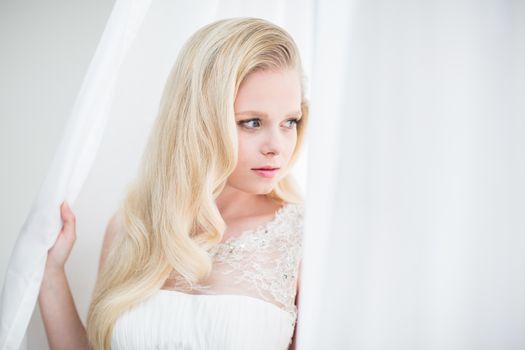 Gorgeous bride on her wedding day (color toned image; shallow DOF)