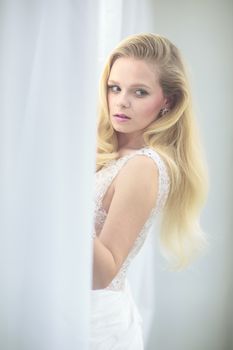 Gorgeous bride on her wedding day (color toned image; shallow DOF)