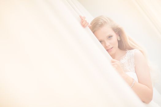 Gorgeous bride on her wedding day (color toned image; shallow DOF)