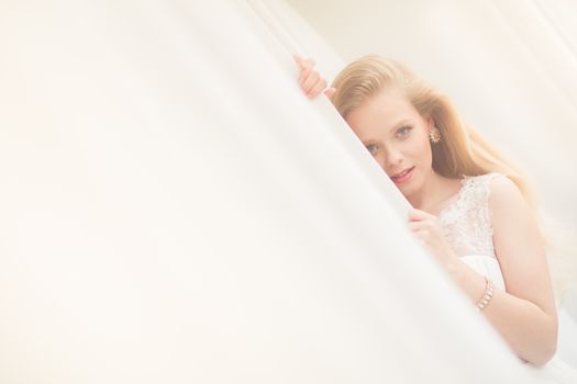 Gorgeous bride on her wedding day (color toned image; shallow DOF)