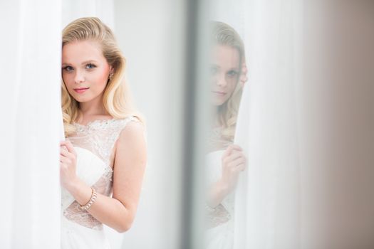 Gorgeous bride on her wedding day (color toned image; shallow DOF)