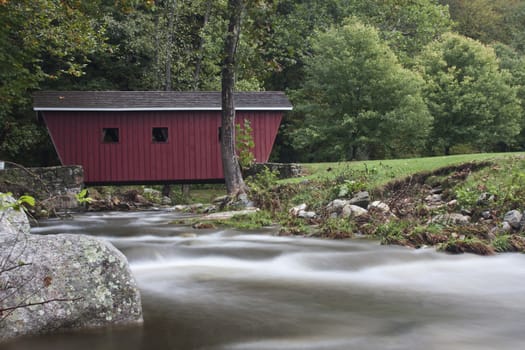 Covered bridge with stream