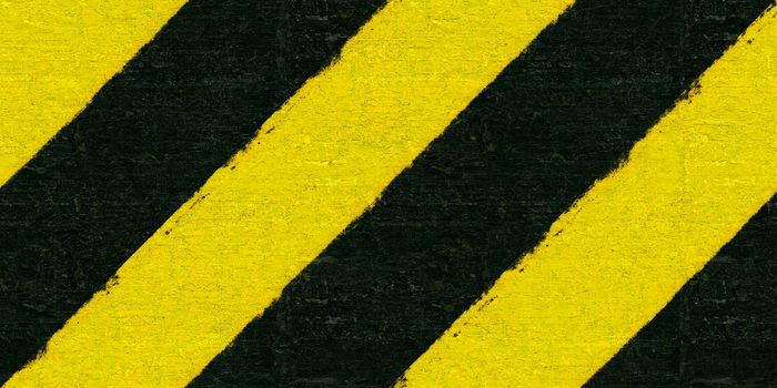 Warning black and yellow hazard stripes texture. Construction sign