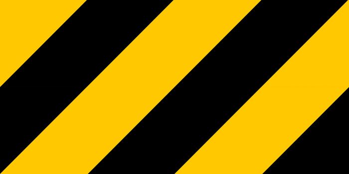Warning black and yellow hazard stripes texture. Construction sign