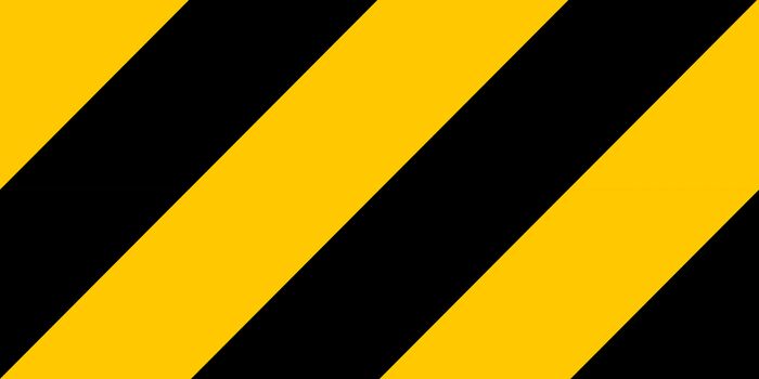 Warning black and yellow hazard stripes texture. Construction sign