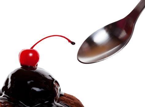 A chocolate covered sundae with a red cherry, ready to eat.  Shot on white background.