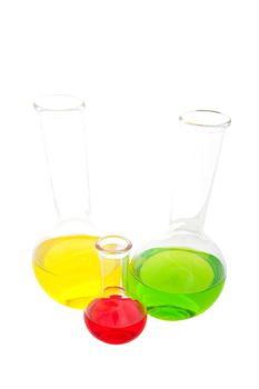Laboratory glass containing various fluids from a wide angle perspective.  Shot on white background.