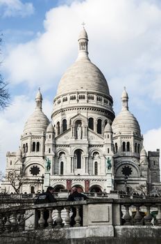 view of the facade of Sacre Couer in Paris, France