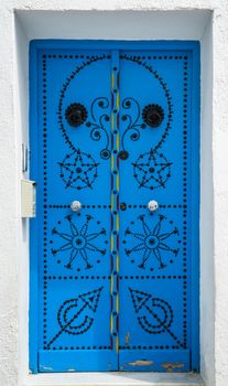 Traditional blue door from Sidi Bou Said in Tunisia. Large resolution