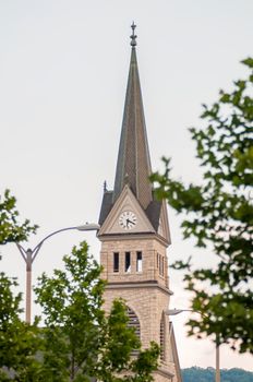 church steeple seen in a city