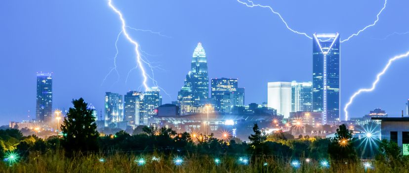 thunderstorm lightning strikes over charlotte city skyline in north carolina usa