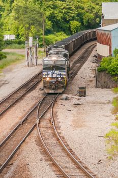 slow moving Coal wagons on railway tracks