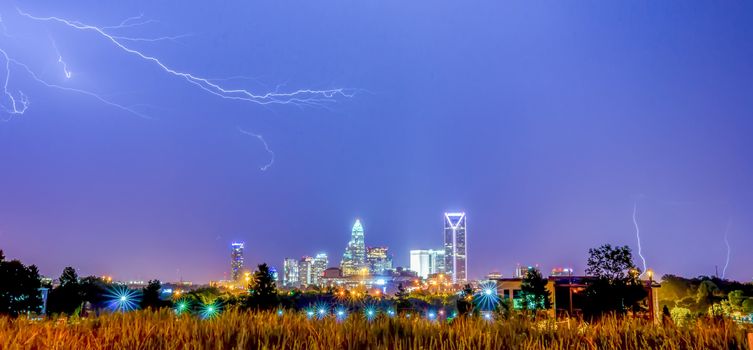 lightning thunder bolts over charlotte skyline