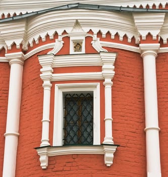 Window of an ancient temple of Peter and Paul in the historic center of Moscow