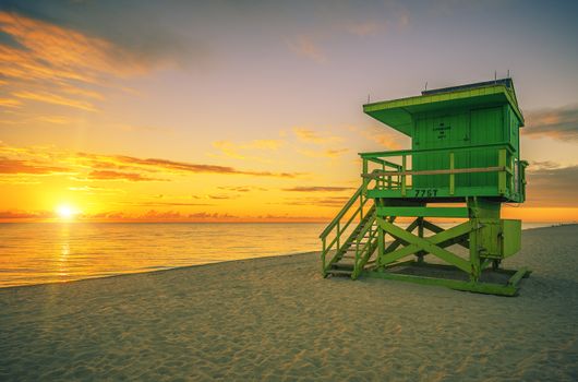 Famous Miami South Beach and lifeguard tower at sunrise, USA