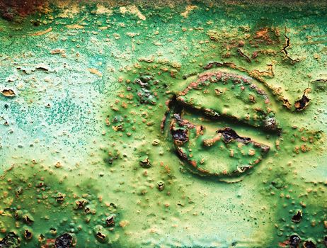 background or texture rusty screws painted in green color