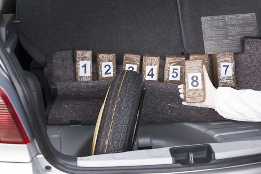 Drug smuggled in a car trunk