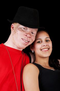 A young African albino man with a mixed-race Caucasian, African-American girl.