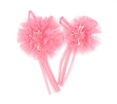 Pink artificial flowers make from fabric for wedding style vintage isolated with white background.
