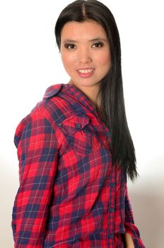Asian woman wearing casual shirt. Chinese female model, friendly face expression.