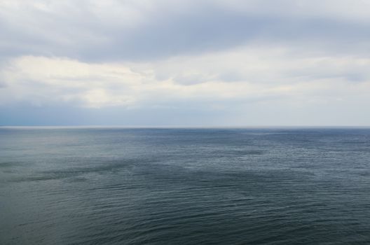 Photo of the Wavy Sea Clear Horizon