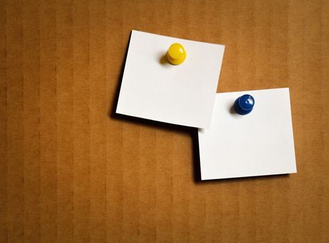 background leaflets on the white board with brown cardboard