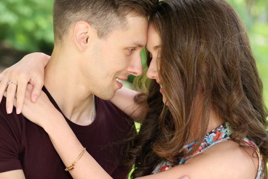 Cute, young couple in the park