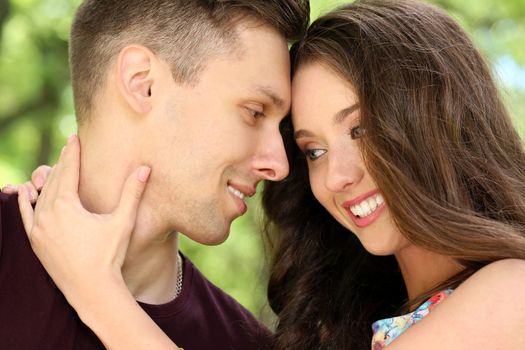 Cute, young couple in the park