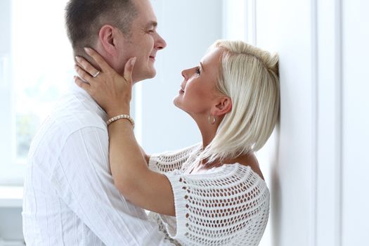 Love, family. Attractive couple at home