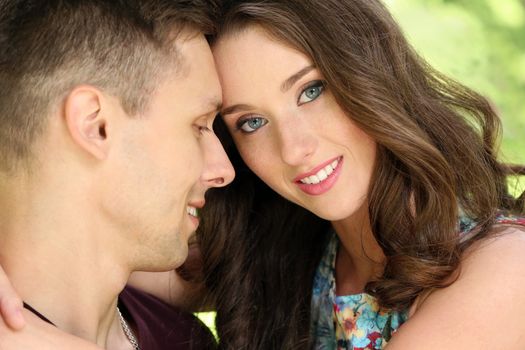 Cute, young couple in the park