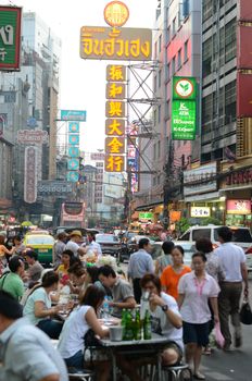 BANGKOK, THAILAND - MARCH 26: Yaowarat Road, the main street in Chinatown, built by King Rama V.This crowded street winds through the bustling heart of Chinatown on March 26, 2014 in China town, Bangkok 