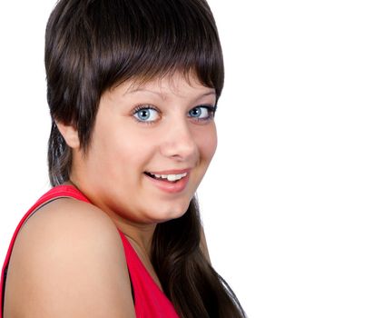 Smiling blue-eyed young girl on a white background. portrait