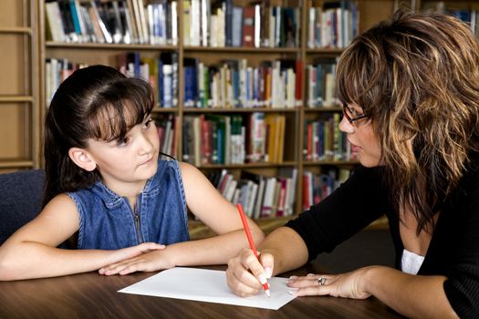 A student being taught one on one.