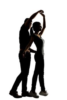 Silhouette of Asian couple dancing, full length portrait on white background.