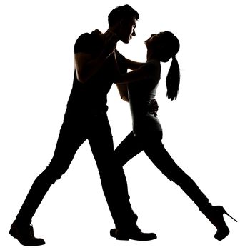 Silhouette of Asian couple dancing, full length portrait on white background.