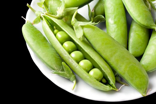 Close-up of a pile of fresh pea pods.
