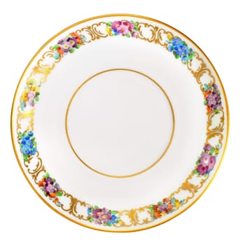 Antique over hundred years old german small porcelain plate. Floral ornament with gold plated lines and circles. Isolated with path on white.