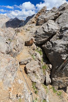 Dolomiti - path between rocks in Costabella ridge
