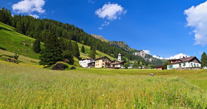 panoramic view of Penia village in Fassa Valley, Trentino, Italy