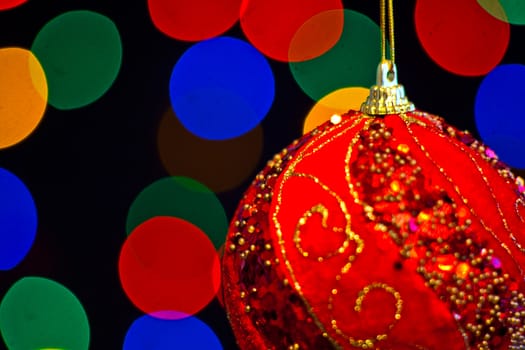 Red Christmas ball with lots of colors light