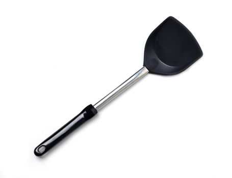 flipper used in frying on white background
