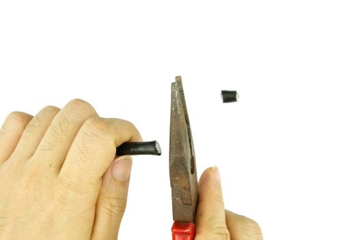 Man use old pliers to cut cable line for repair isolated with white background.