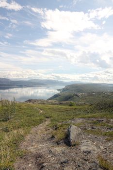 Scenic panorama of fjord on in northern Norway on sunny summer day