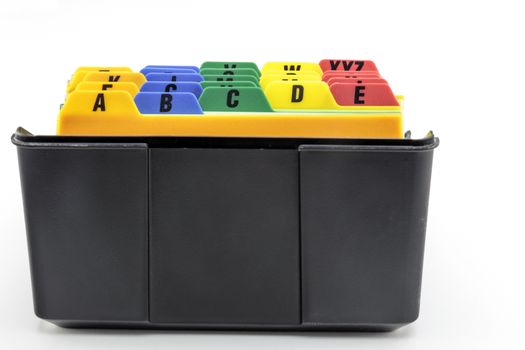 Black plastic index card filer with colorful alphabetical tab system.