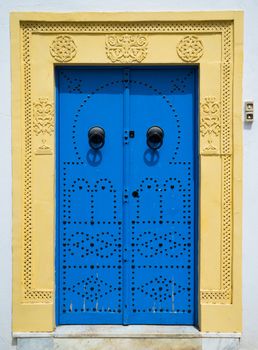 Blue door with ornament from Sidi Bou Said in Tunisia. Large resolution