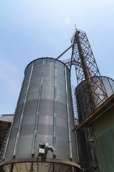 Big metal silo agricultural granary in Thailand