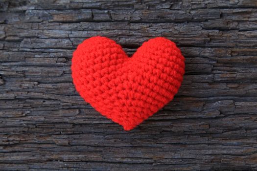 Love heart on wooden background