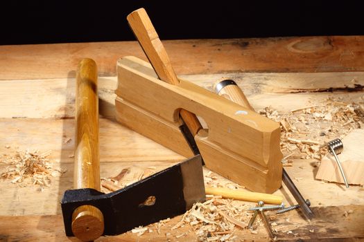 Plane close up of carpenter's workbench 